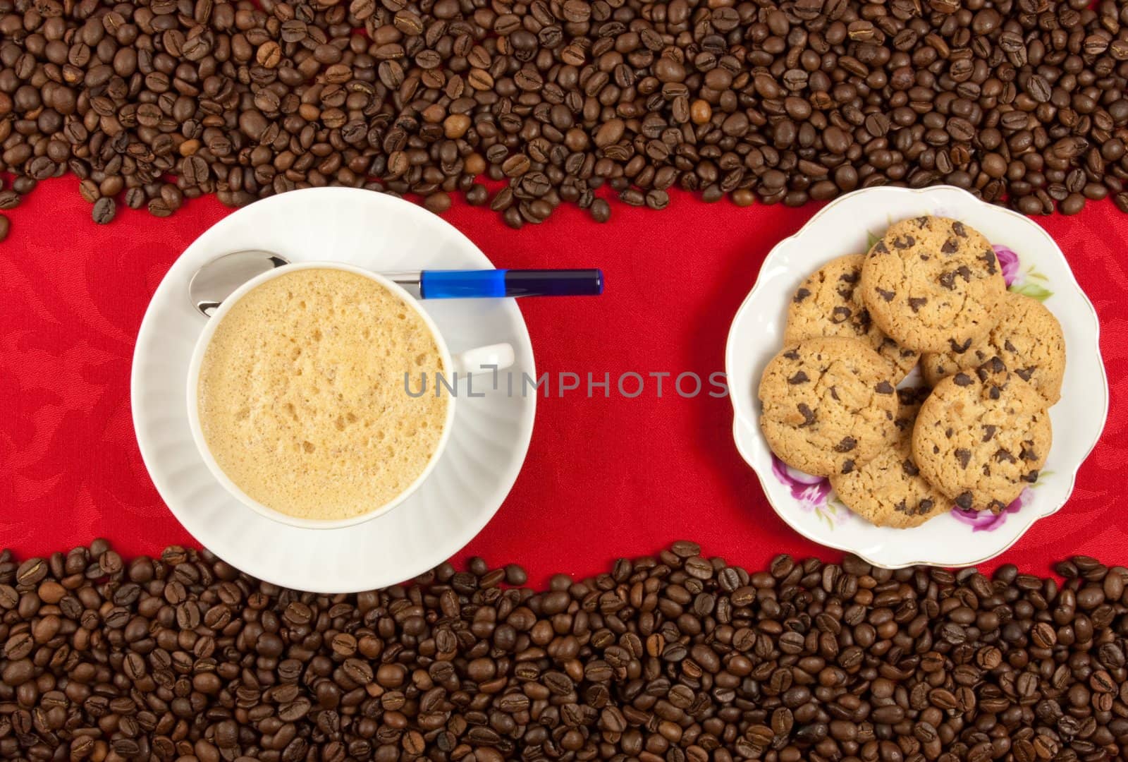 coffee cup from above with coffee beans