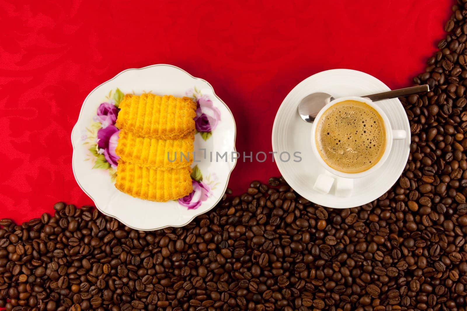 coffee cup from above with coffee beans