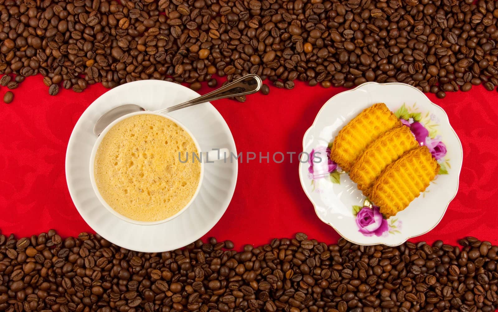 coffee cup from above with coffee beans