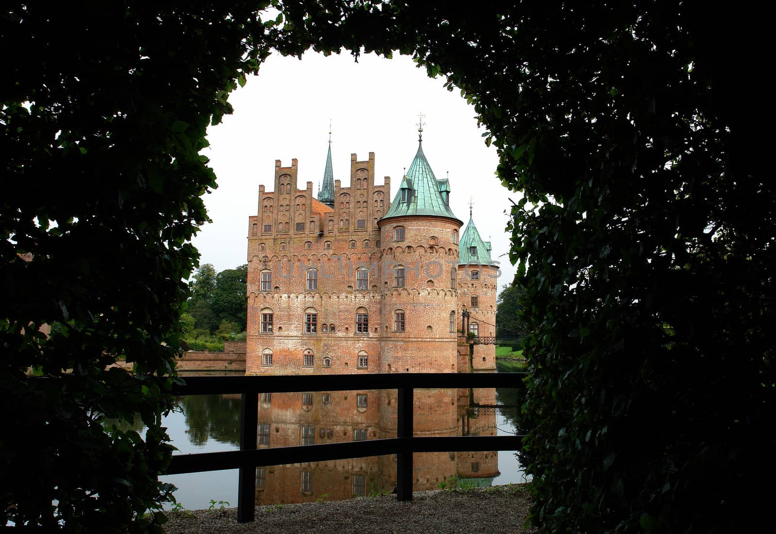  Egeskov castle slot landmark fairy tale castle in Funen Denmark view from the garden                               