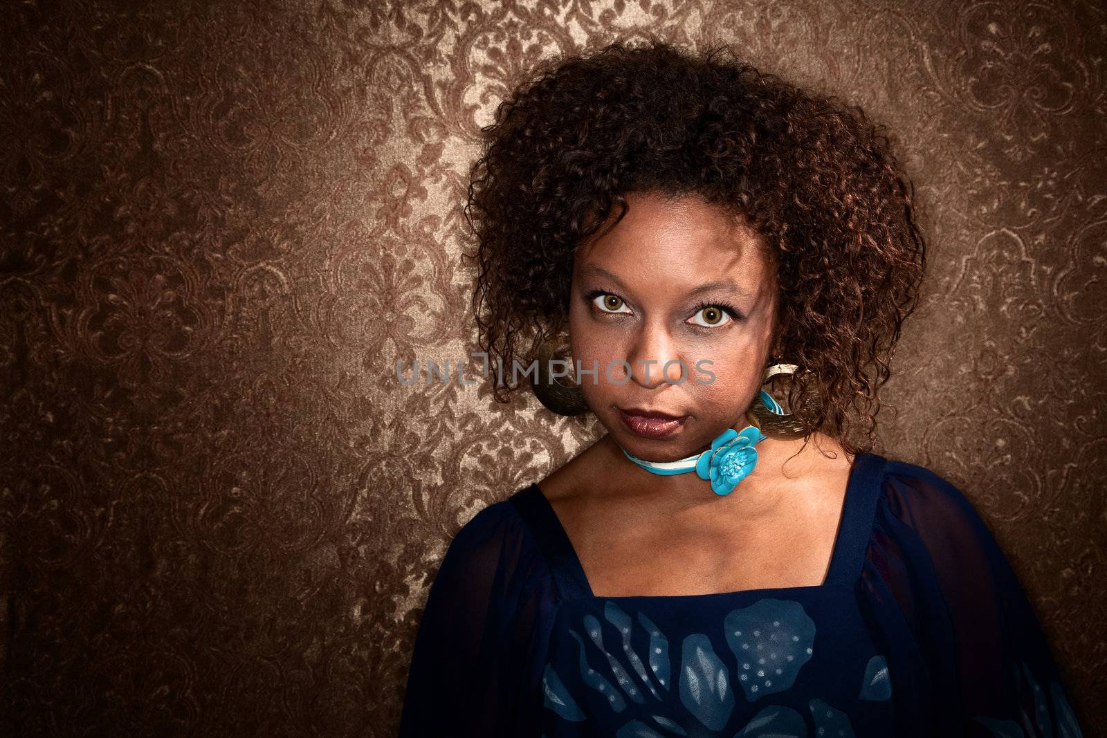 Pretty African American woman in blue disco dress
