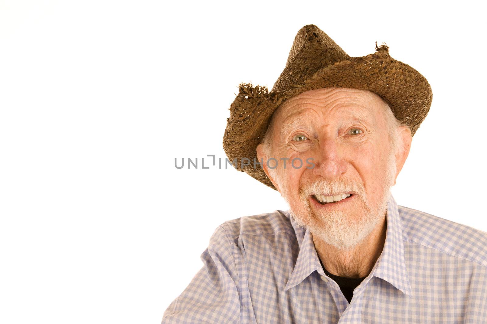 Hansome senior man wearing straw cowboy style hat