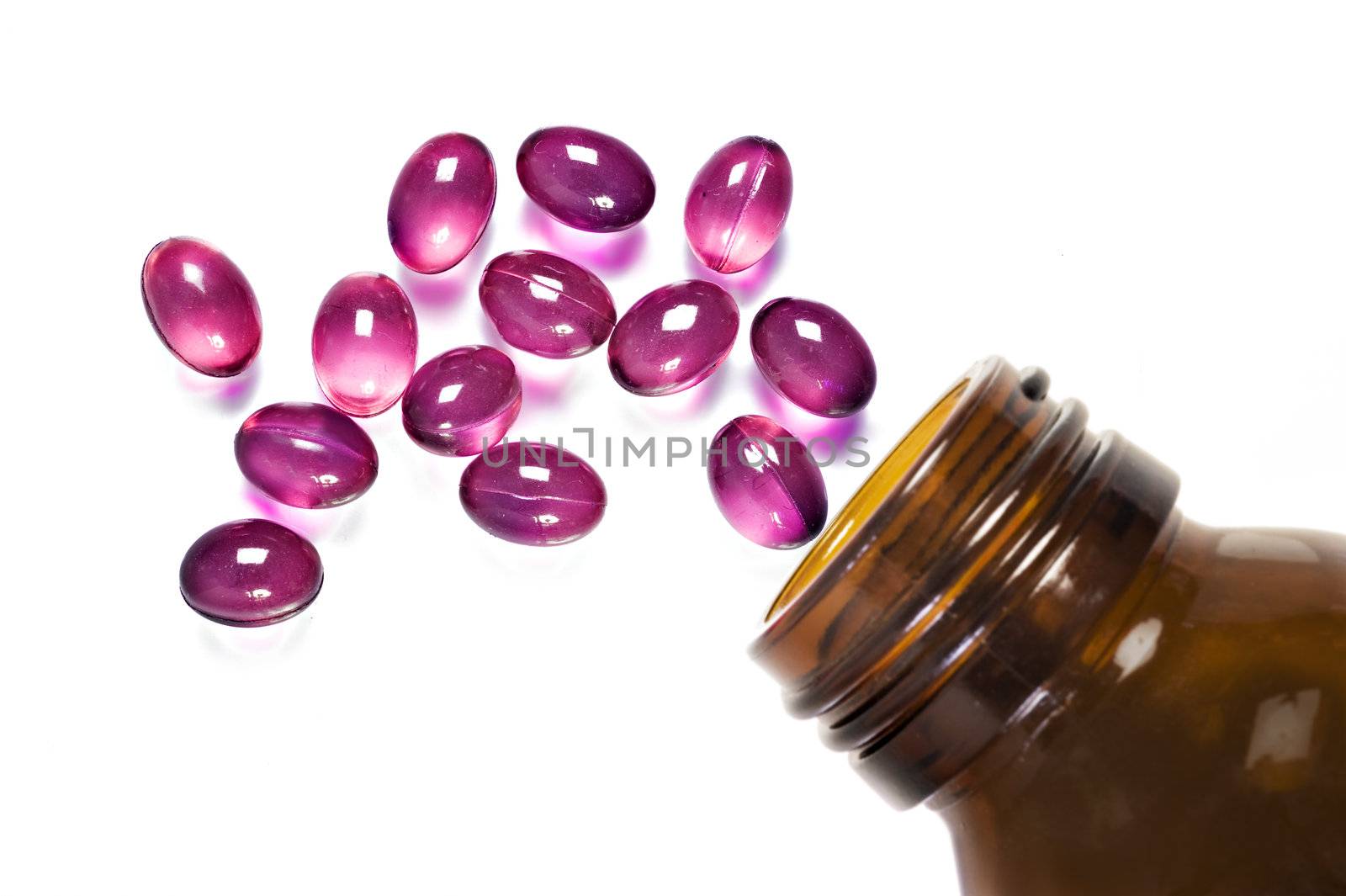 Pill and pill bottle on white background with space for text