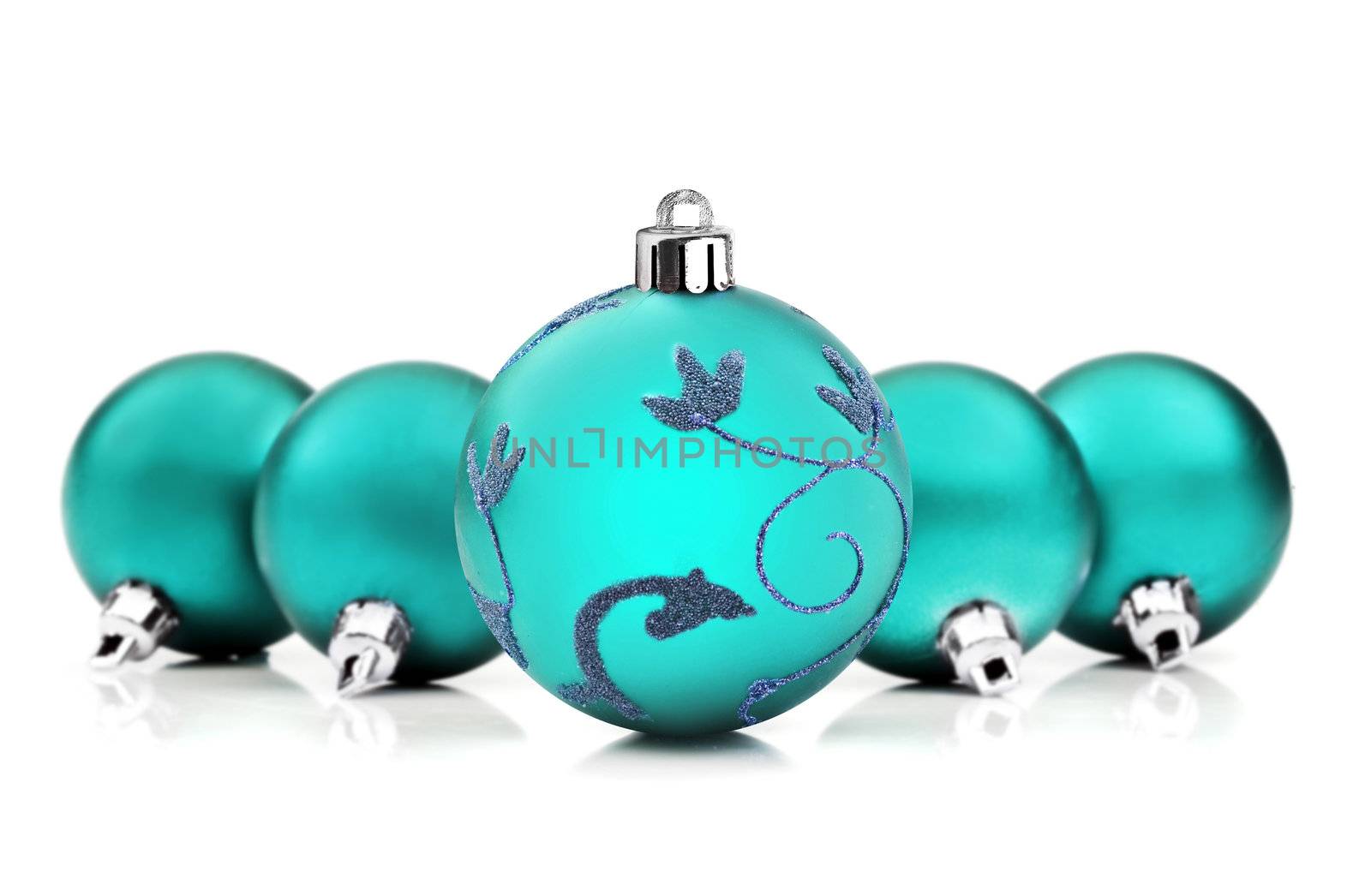Blue christmas baubles on white background with space for text