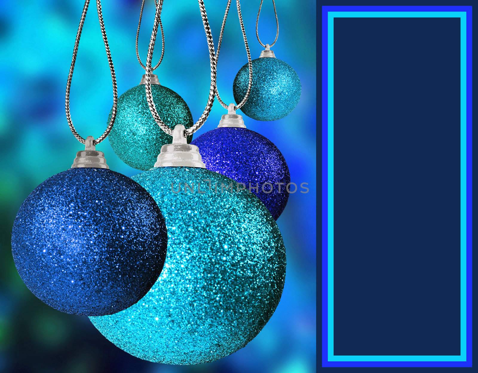 Close up of blue christmas baulble balls in different sizes  hanging on strings