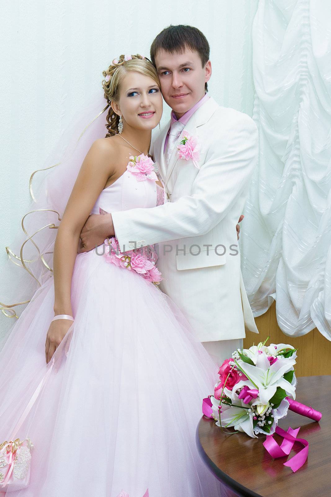 Bride and groom in wedding attire by pzRomashka