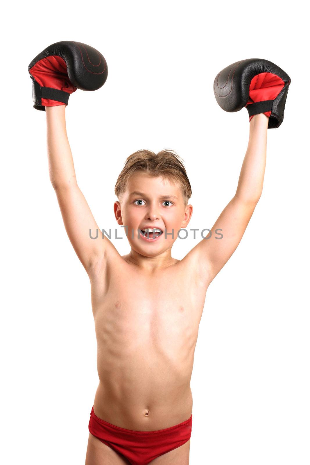 Young boxer with arms raised in victory