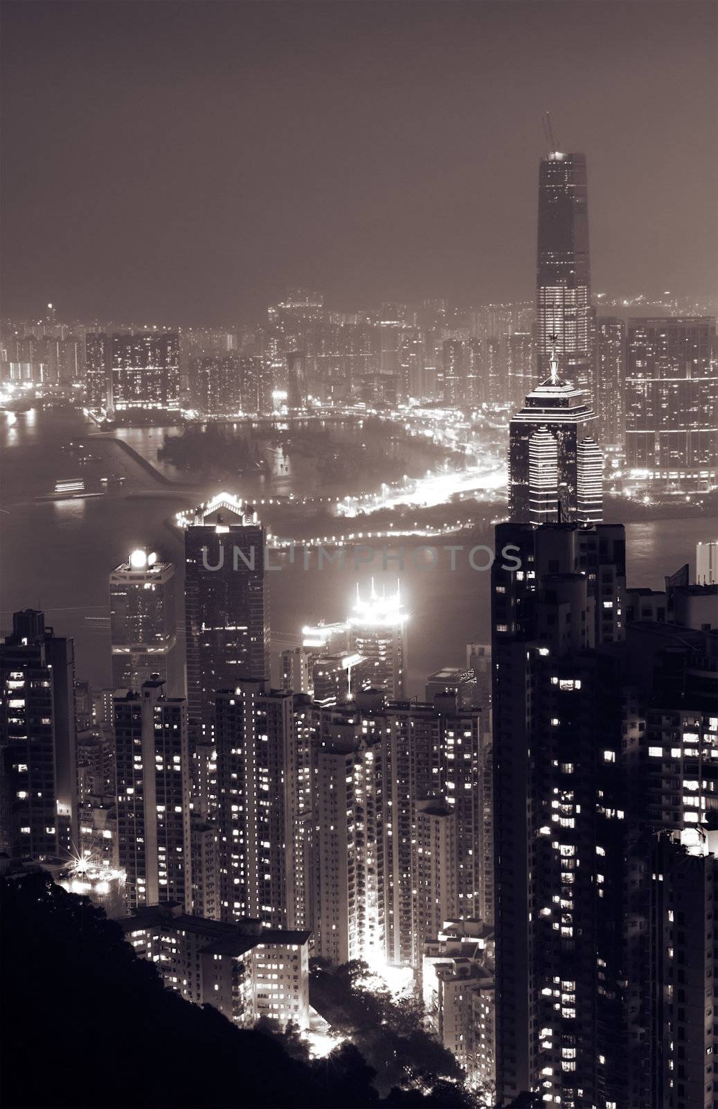 Landmark of Hong Kong city with famous building and skyscraper in the night.