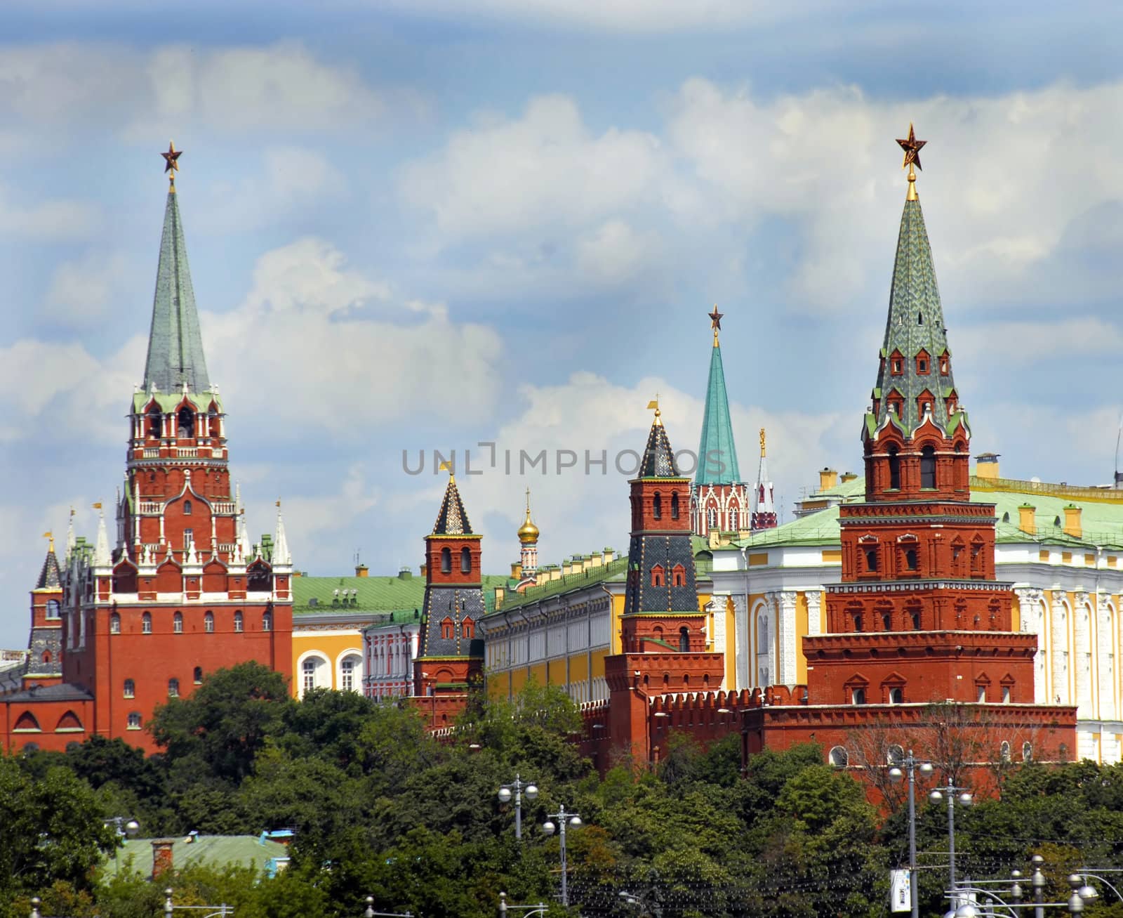 Moscow Kremlin towers cityscape over blue sky