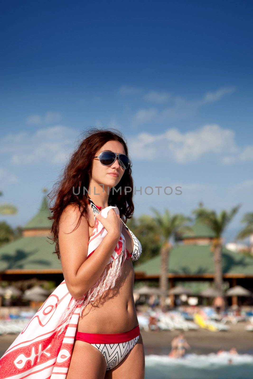 Pretty girl on the seashore by Vof