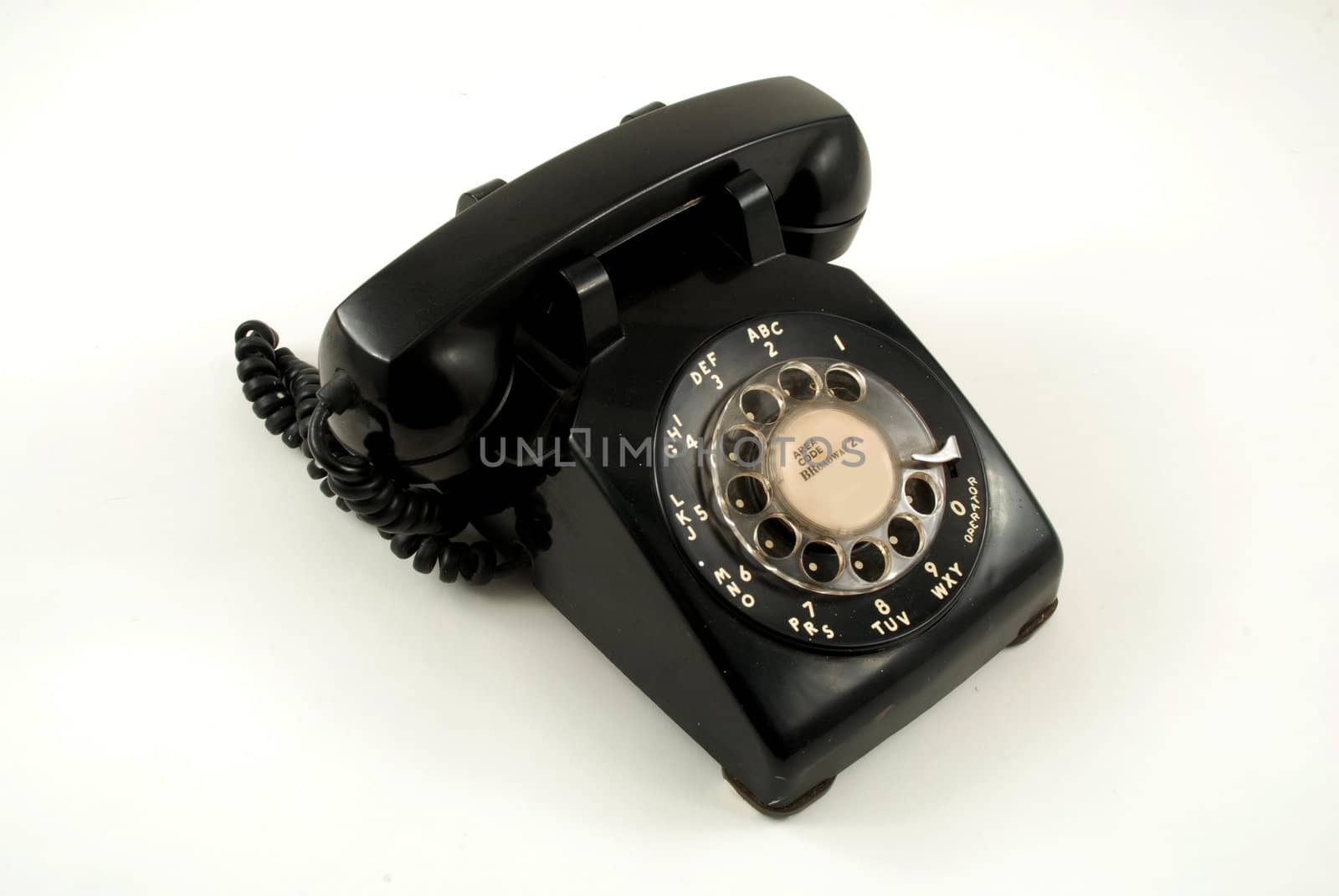 Pictures of an older, analog type telephone