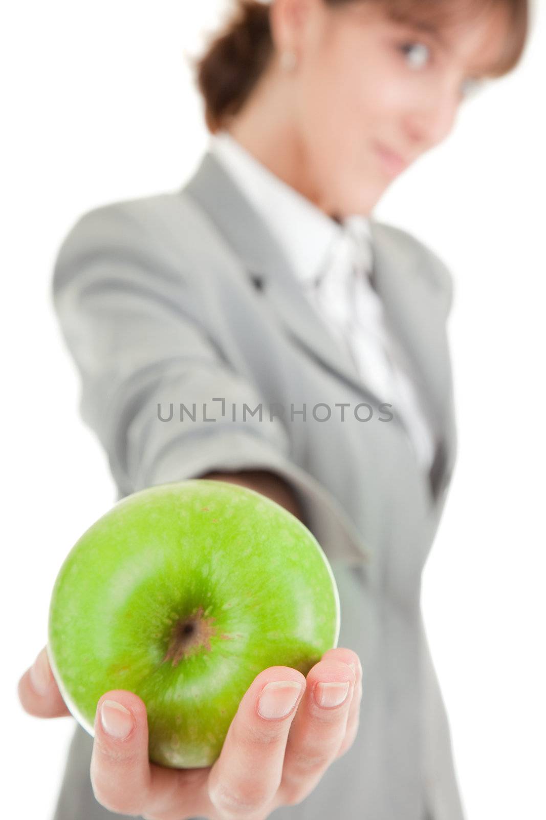  smiling woman in business clothing with apple