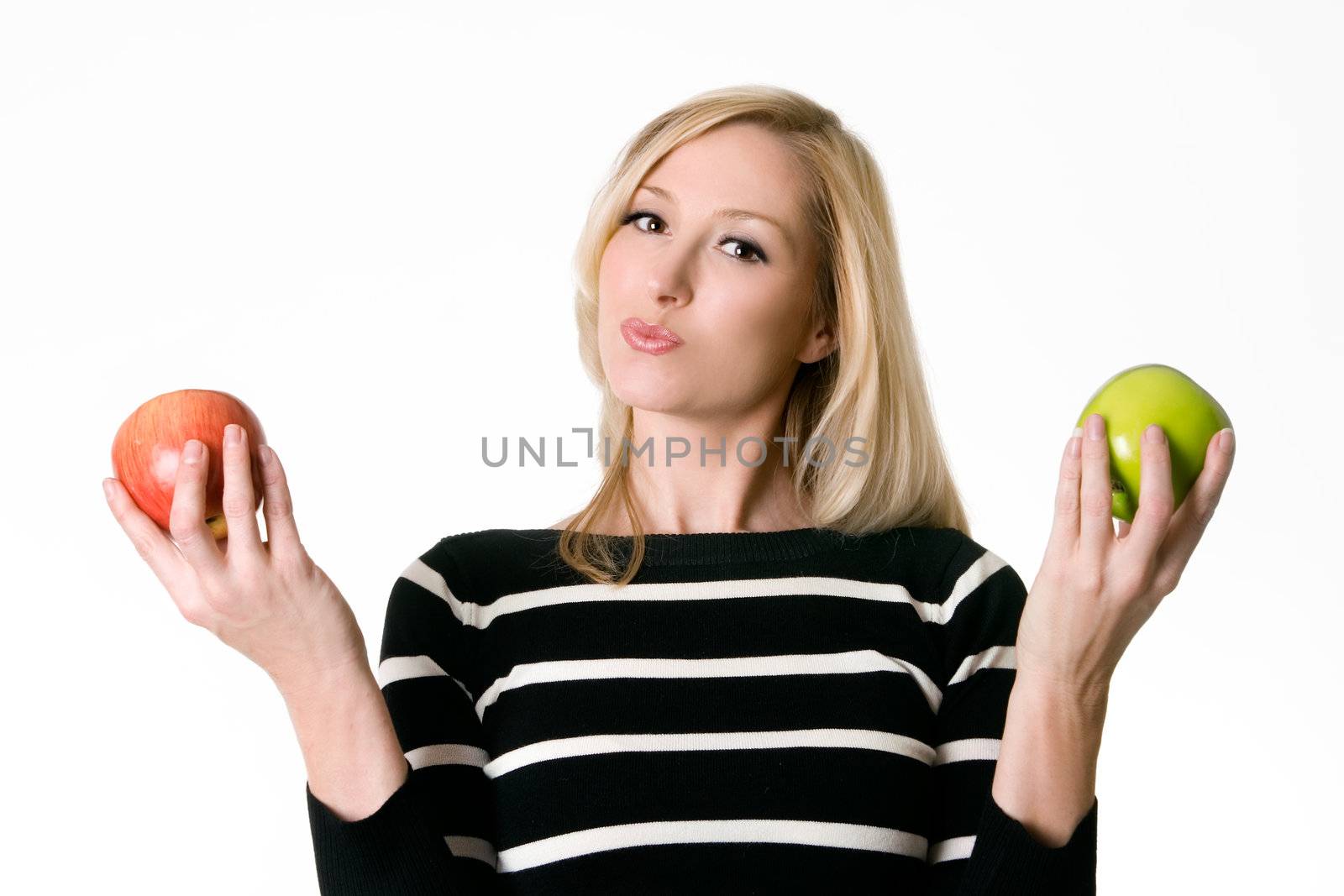 Healthy Choices.  A woman holding a red and green apple in her hands.