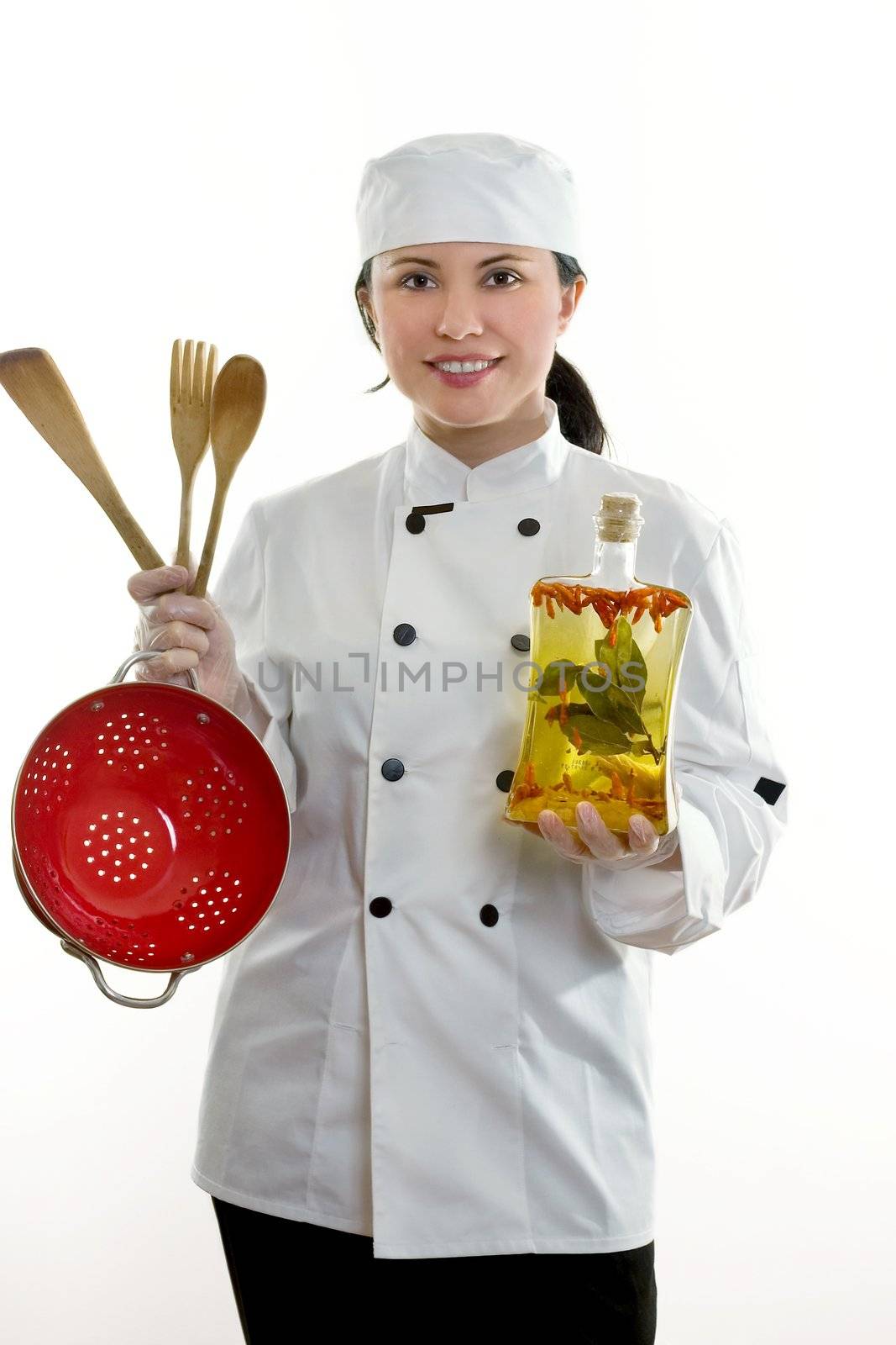 Kitchenhand or chef holding utensils