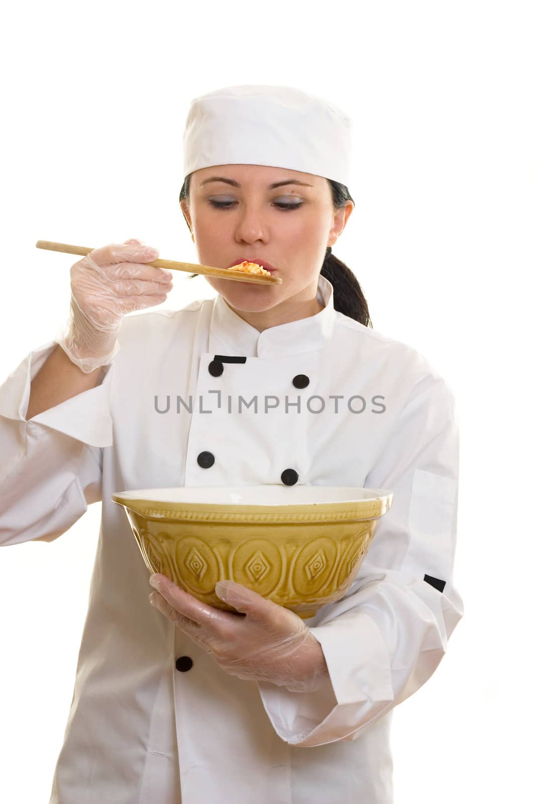 Chef samples food for flavour