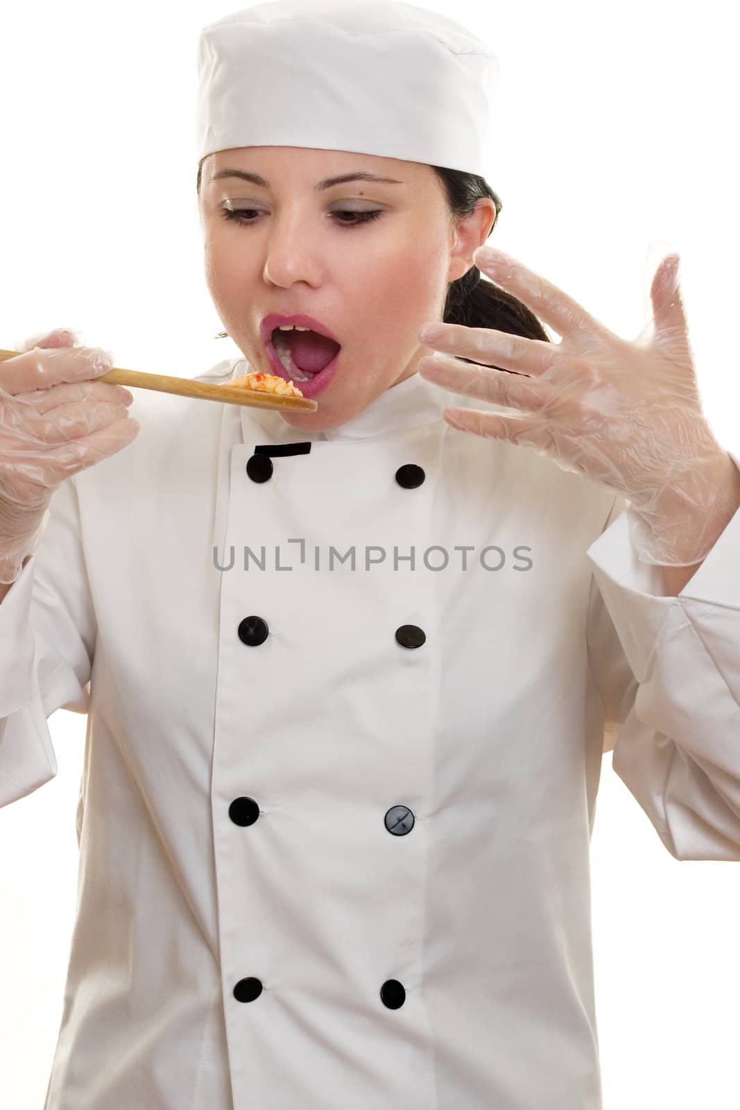 Chef with spoon of hot food