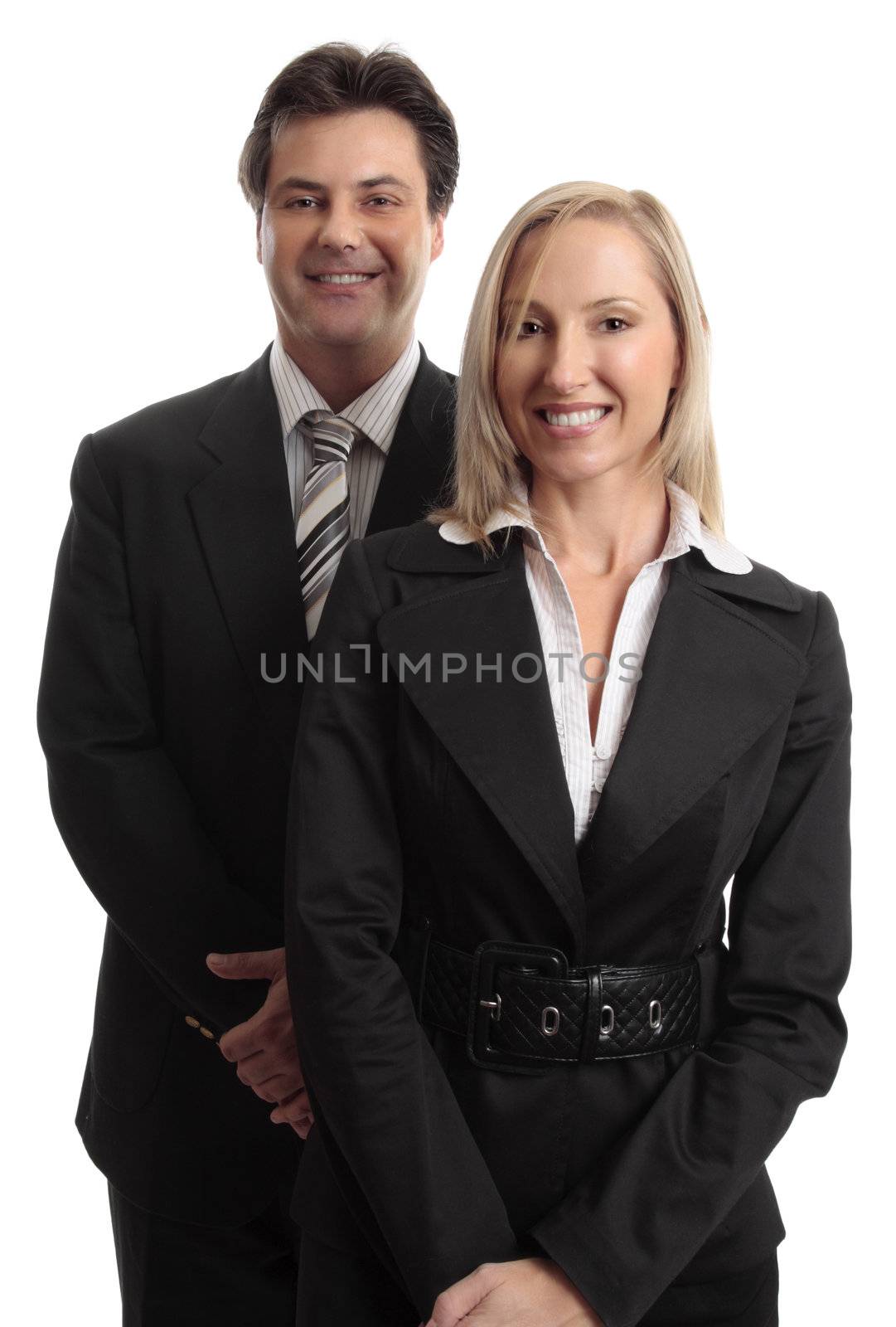 Smiling businessman and businesswoman standing together.