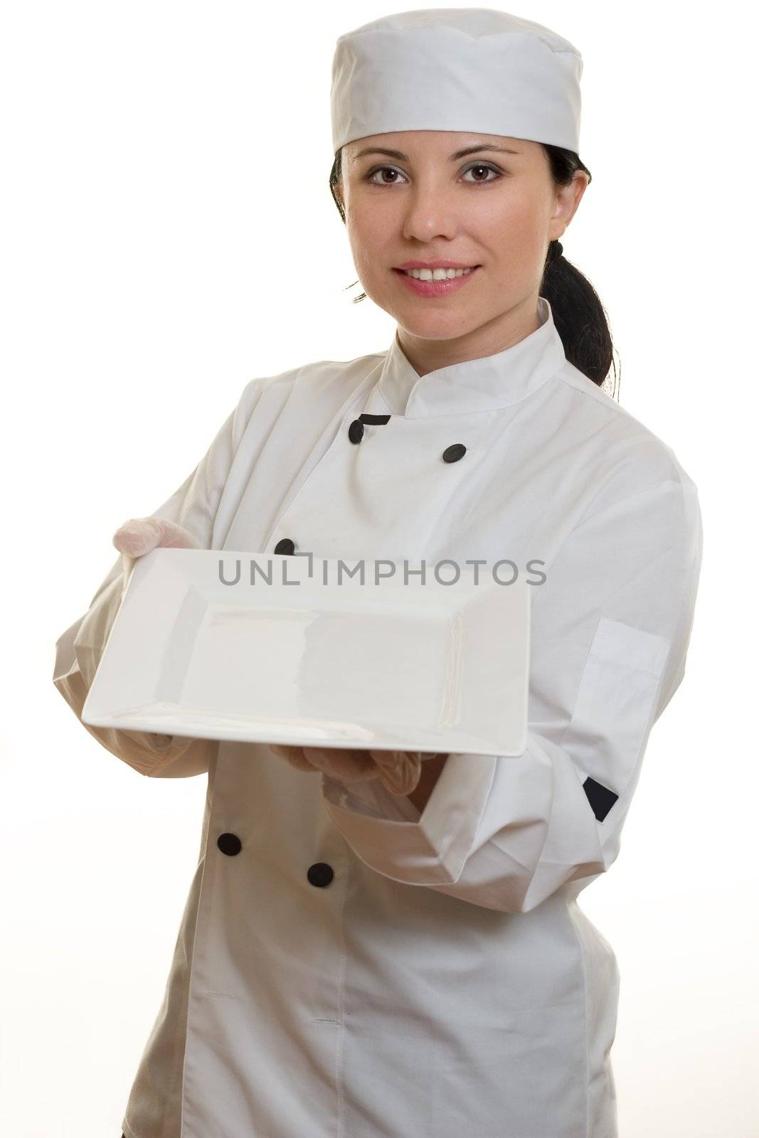 Chef holding a white plate