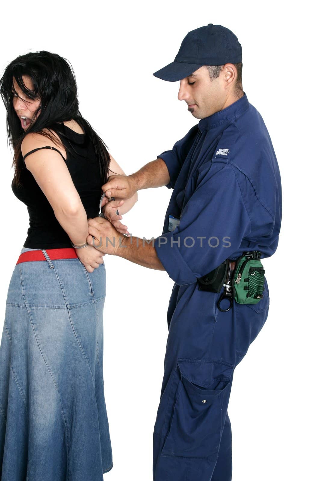 Suspect female being handcuffed by an officer