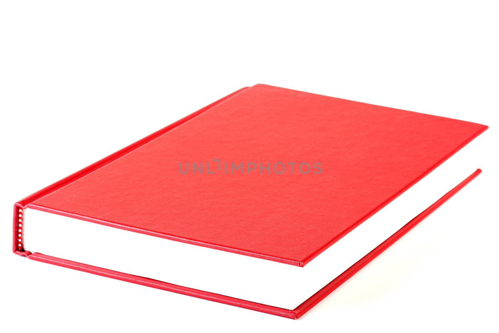 The red thick book for reading on a white background.