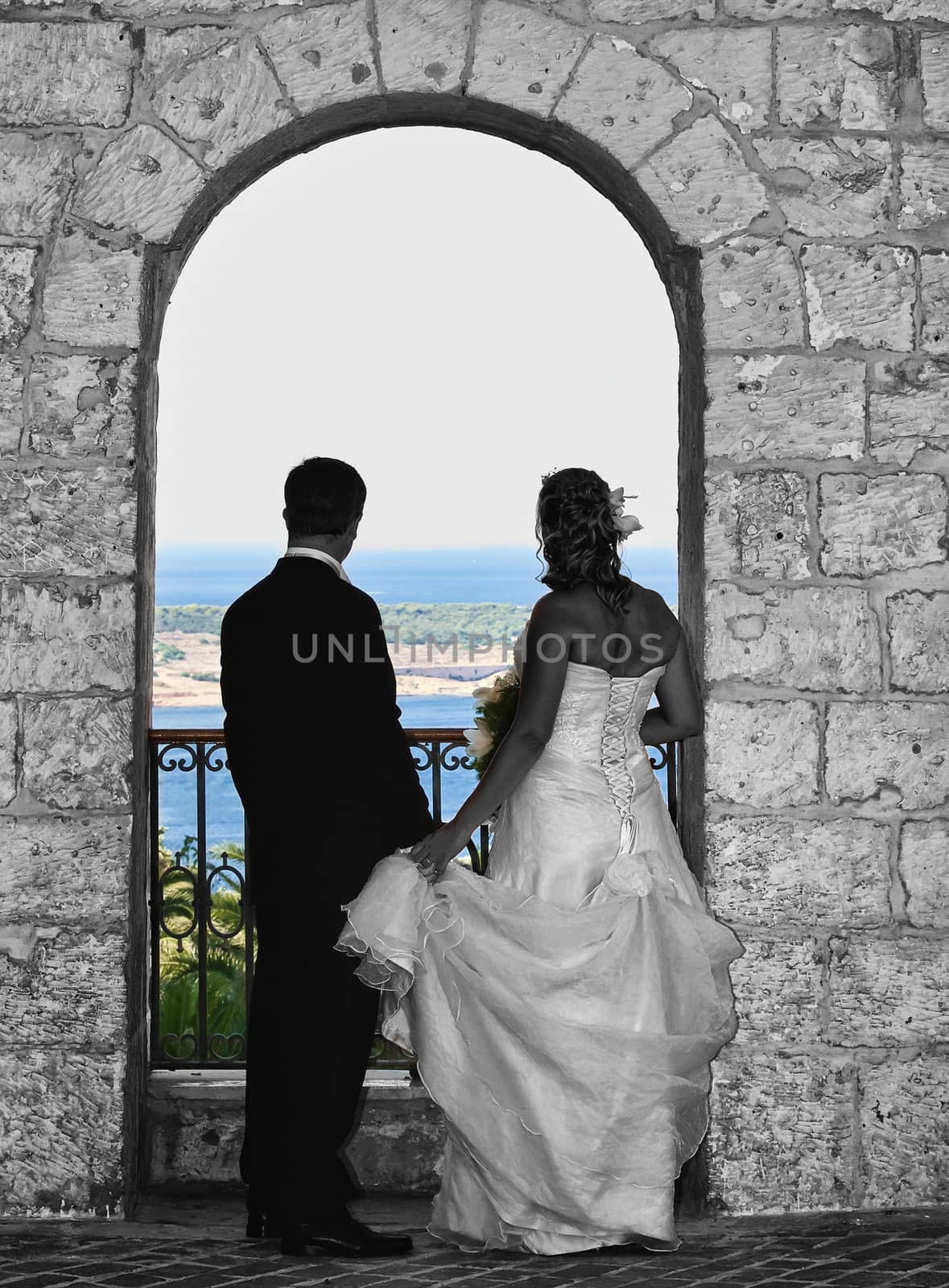 A newly wed couple enjoying scenery in Malta
