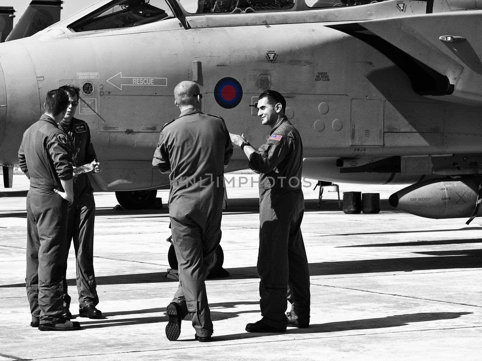 LUQA, MALTA - SEP 26 - Jet fighter pilots having a chat during the Malta International Airshow 26th September 2009