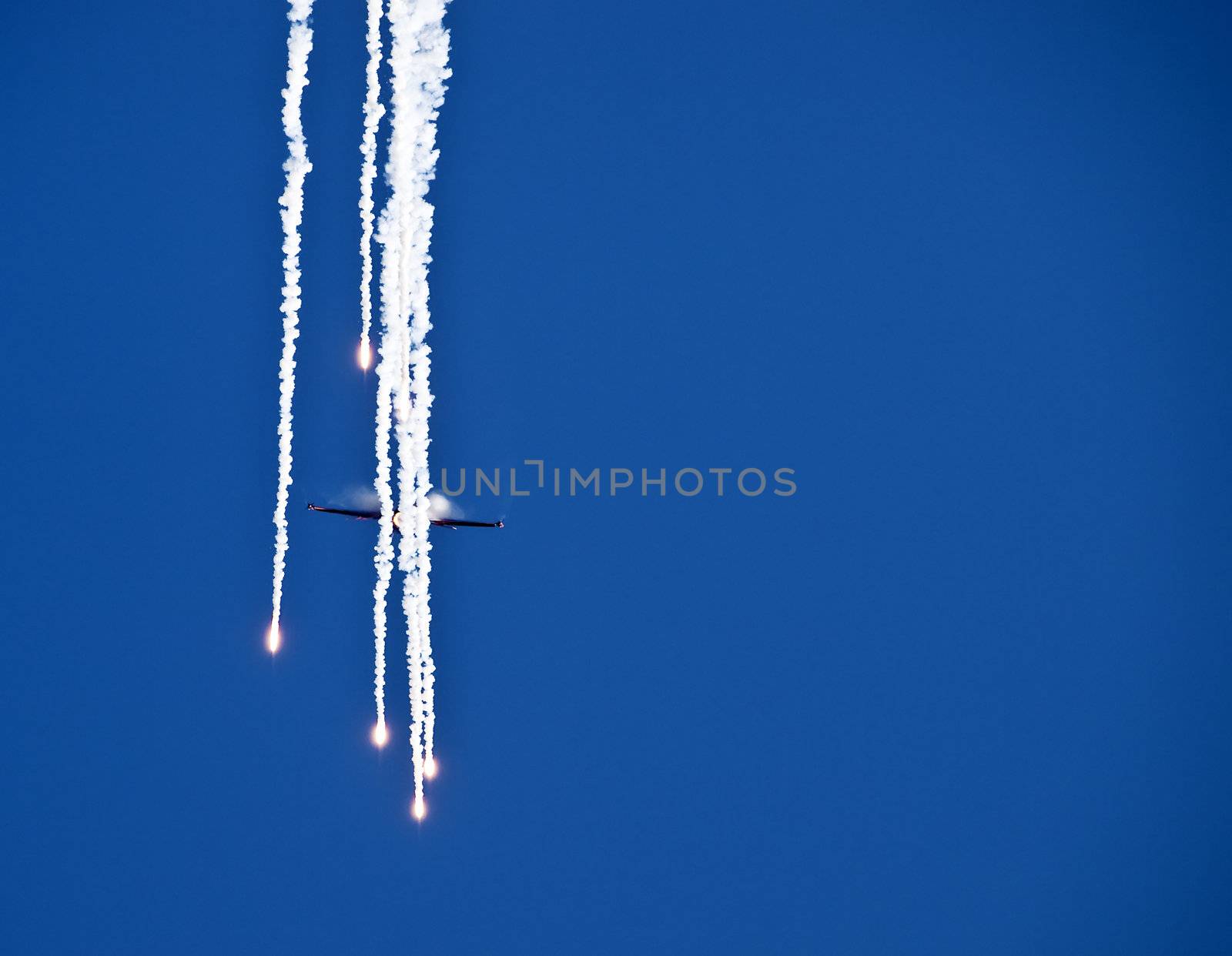 LUQA, MALTA - SEP 26 - F16 of the RNLAF Demoteam flied by Capt. Ralph (Sheik) Aarts releasing flares during the Malta International Airshow 26th September 2009