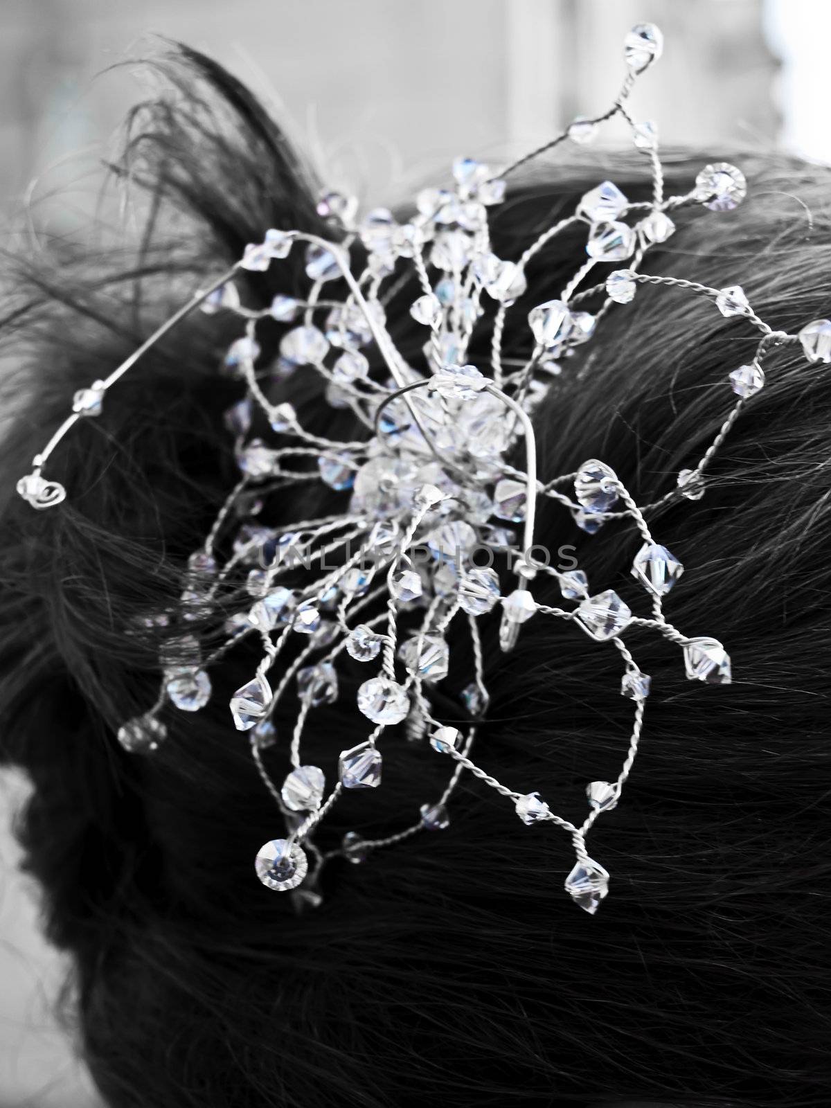 Detail of hairstyle and decor on a bridal hairdo