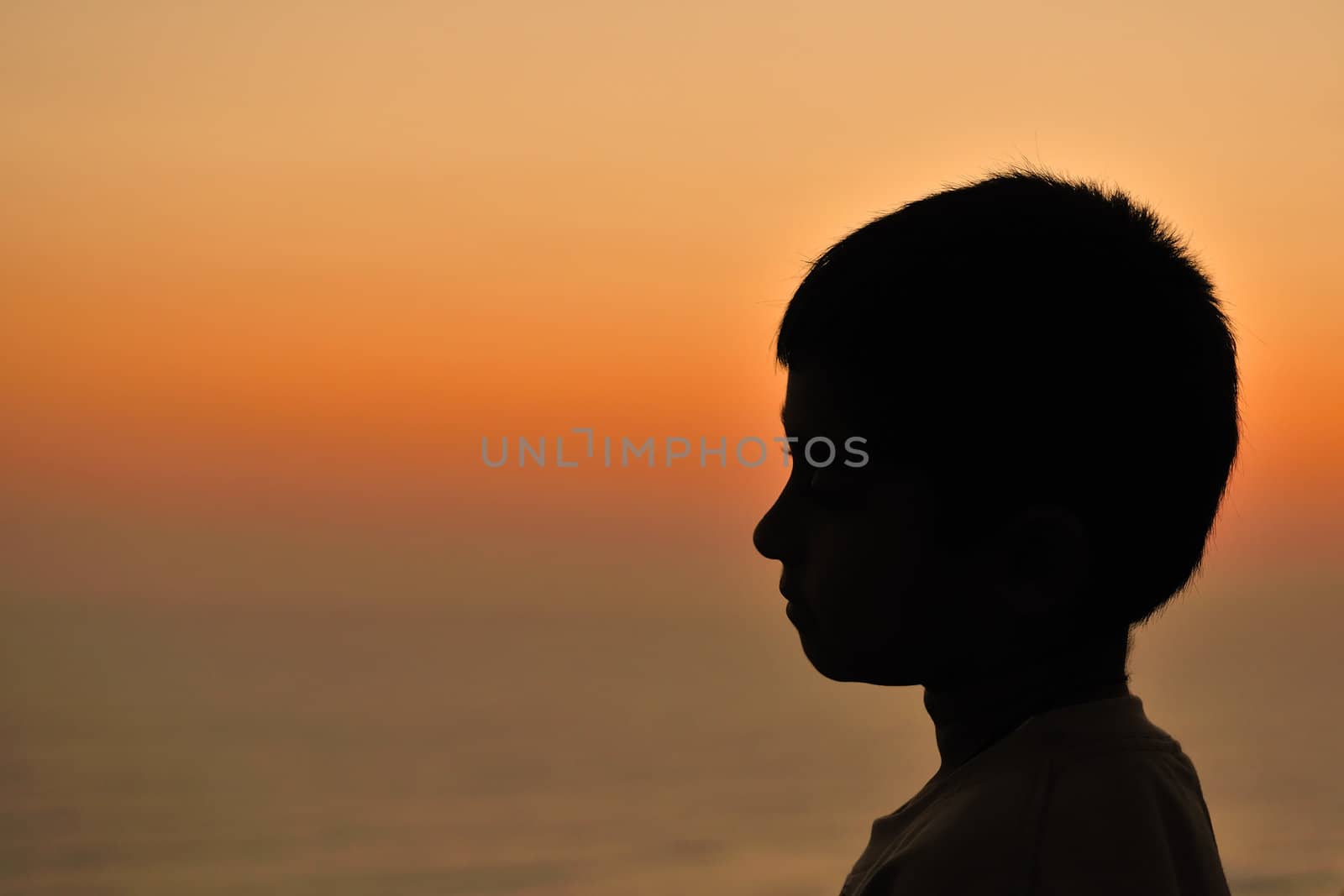 An young man enjoying the gorgeous sunset