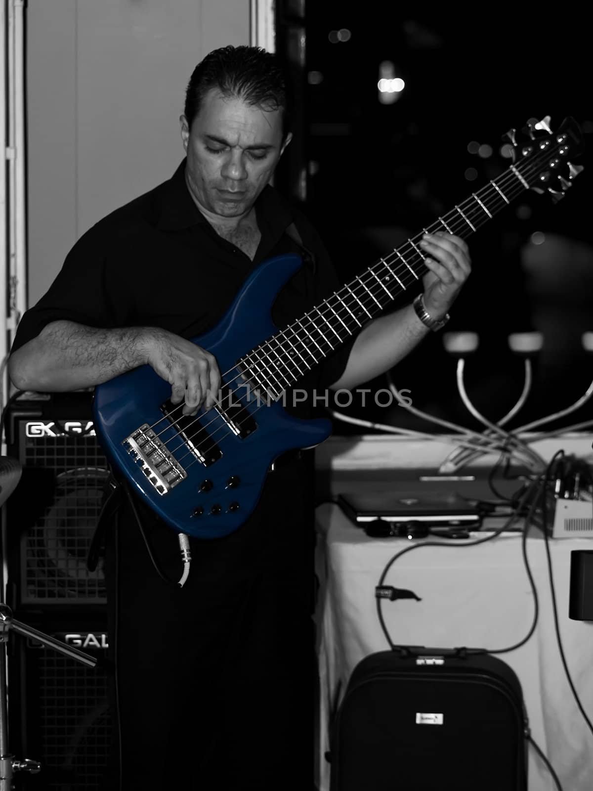 ST JULIANS, MALTA - AUG 28 - Bassist performing during a private function on 28th August 2009
