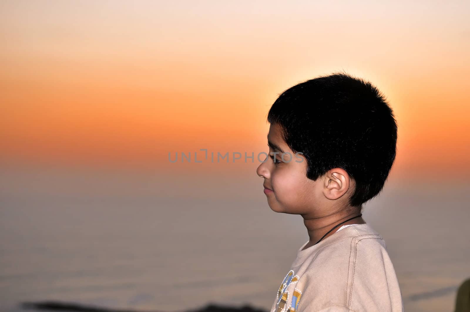 An young man enjoying the gorgeous sunset
