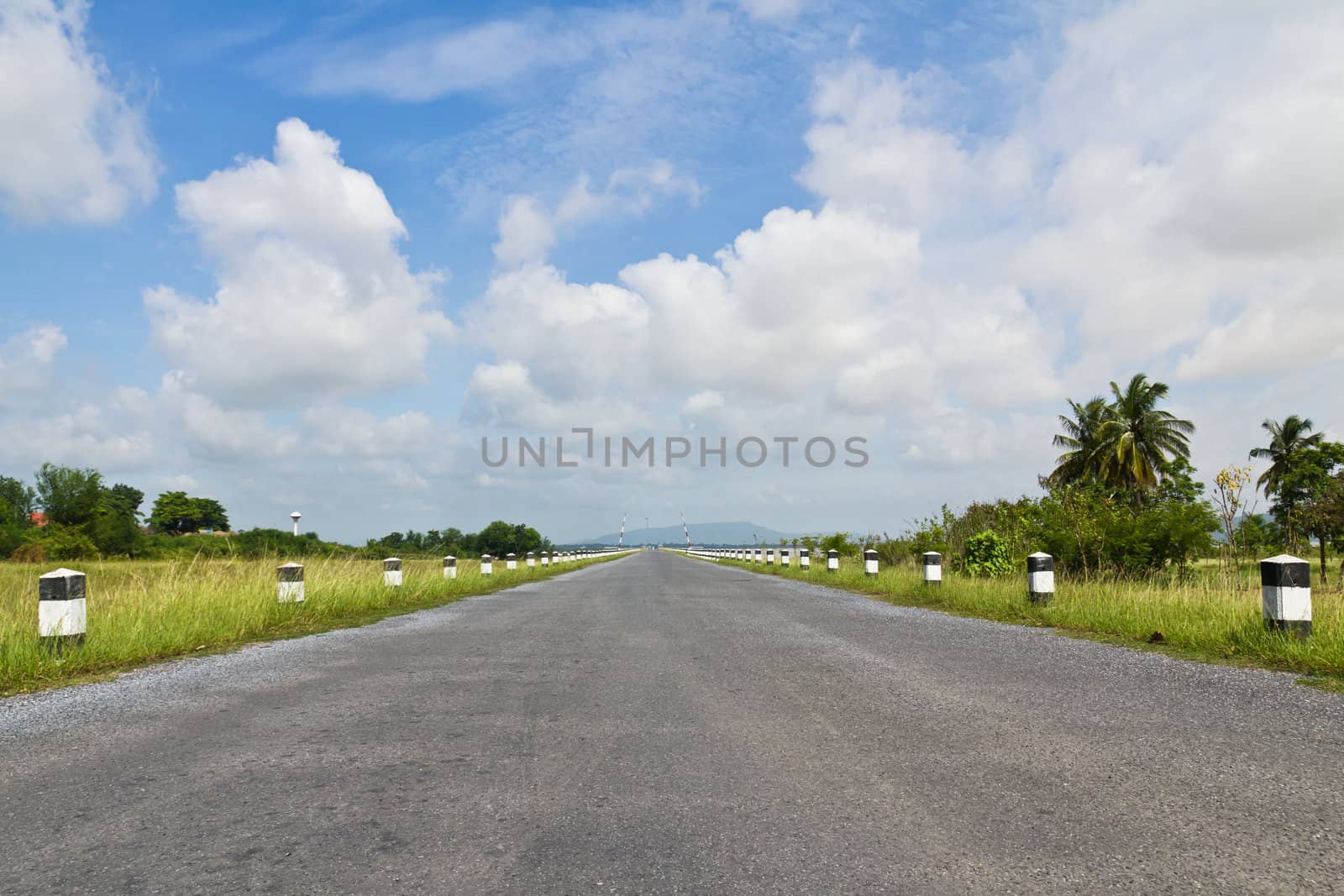 Road asphalt to mountain island