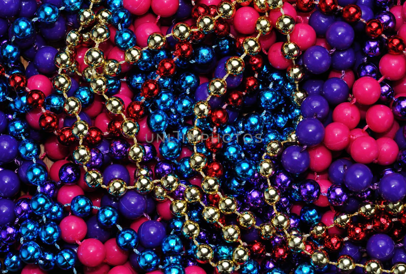 colorful beads as an Abstract background texture by PDImages