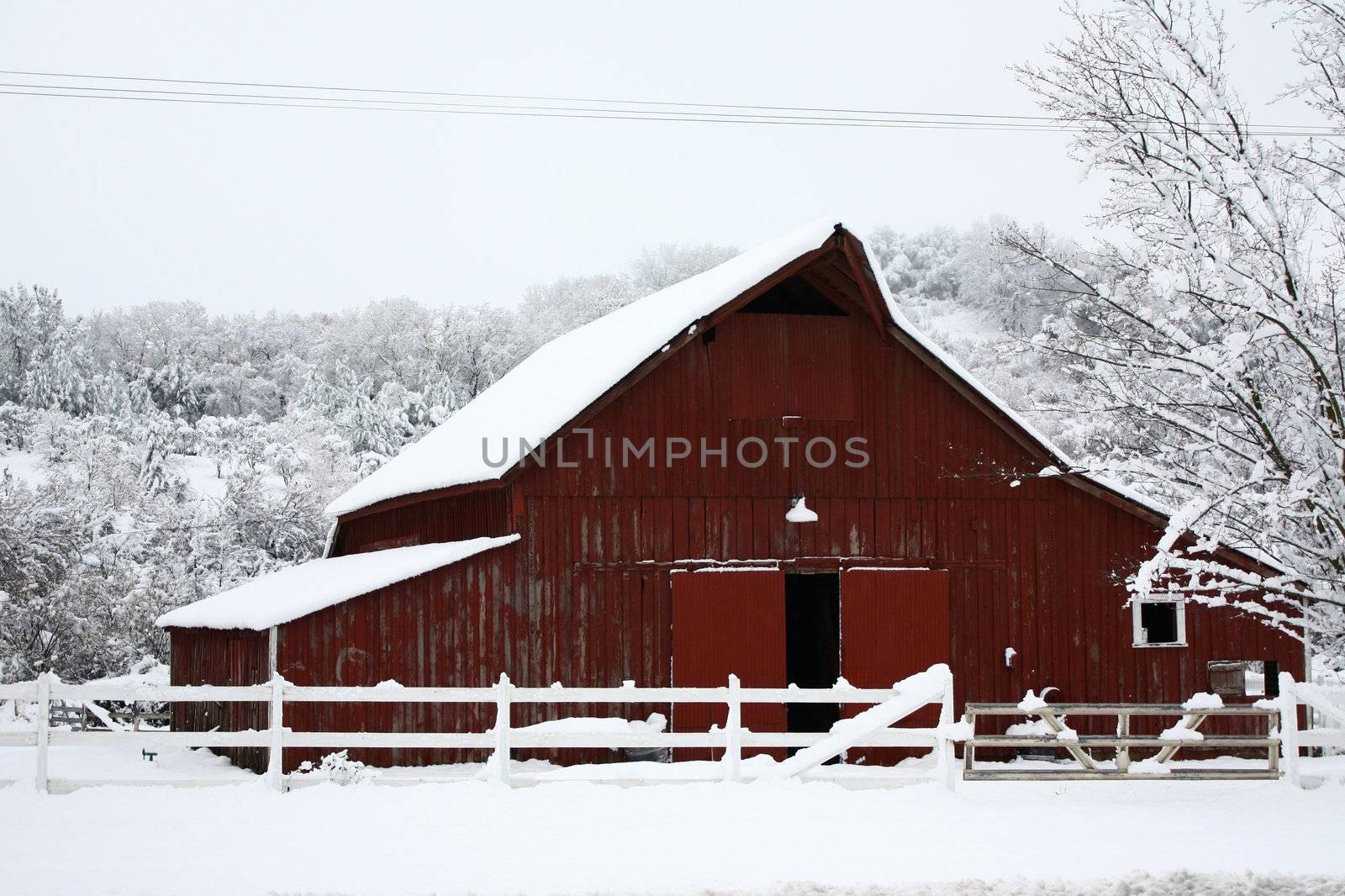 Big red barn in the snow