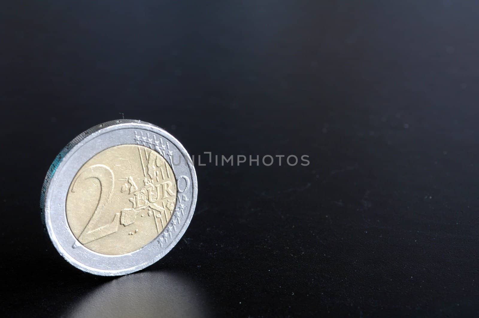 money or euro coin showing financial success concept