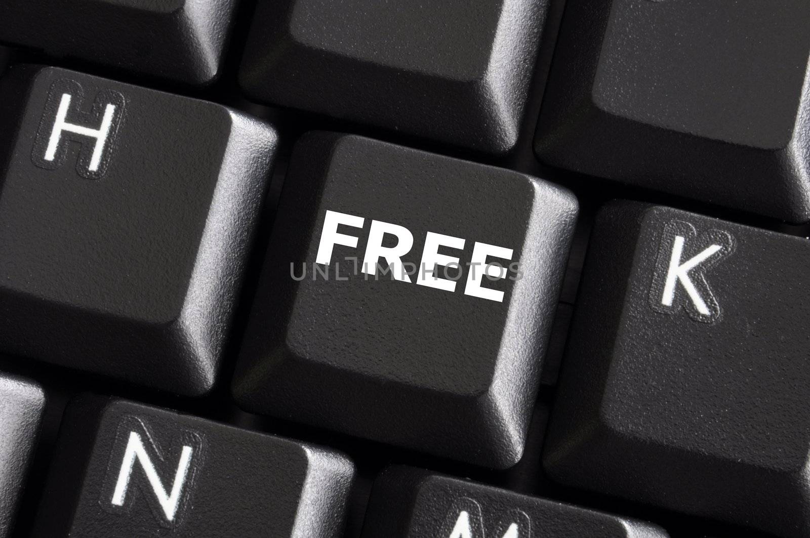 computer keyboard with word free on a button or key