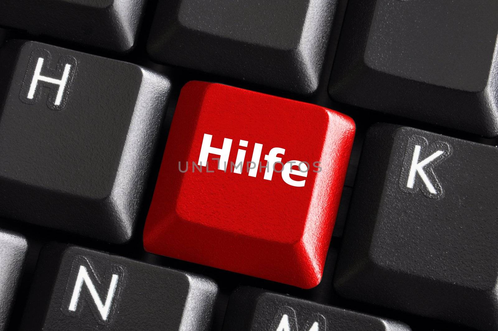 german word hilfe showing help or assistance concept with keyboard
