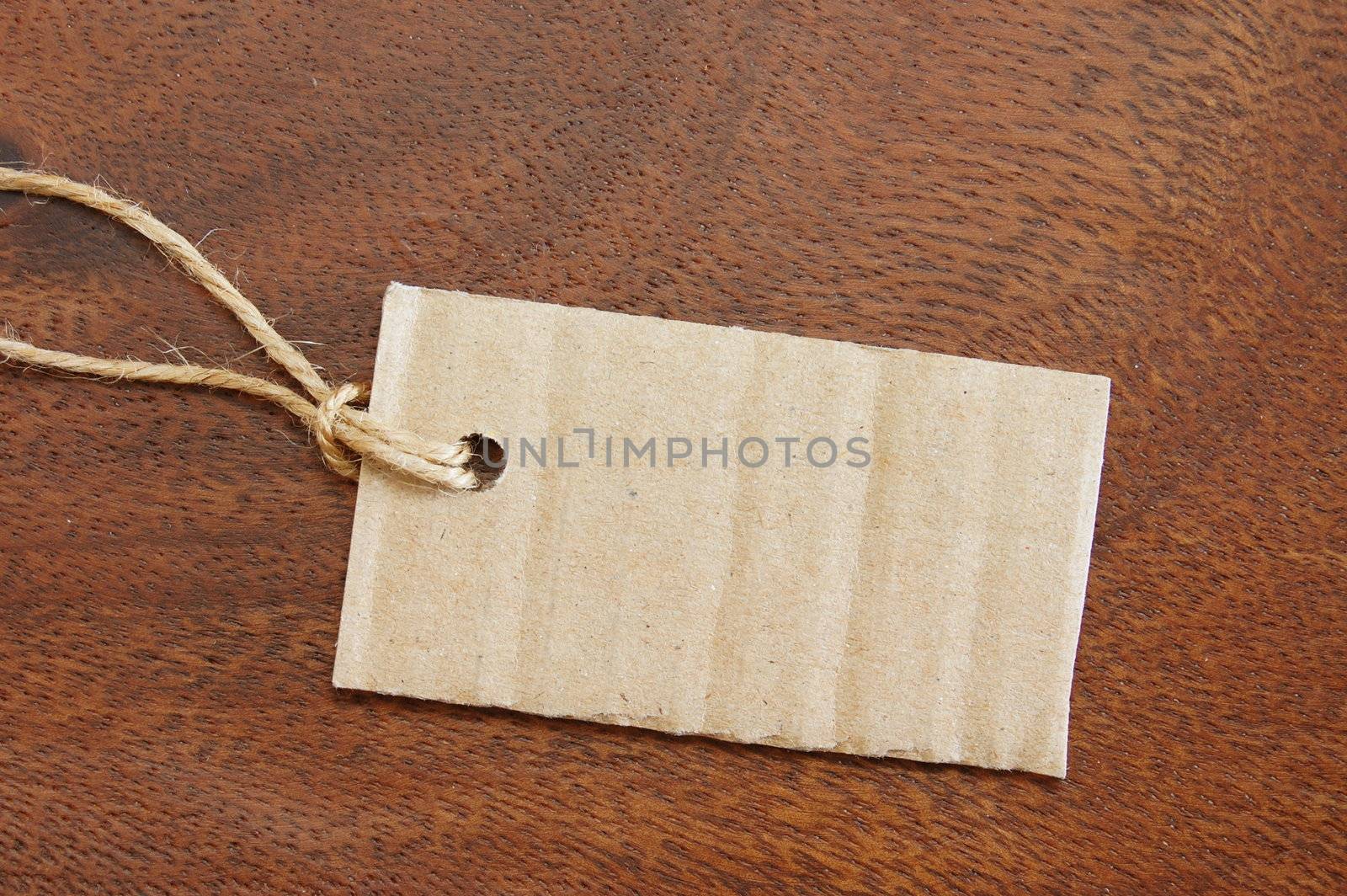 blank price tag with copyspace on wood
