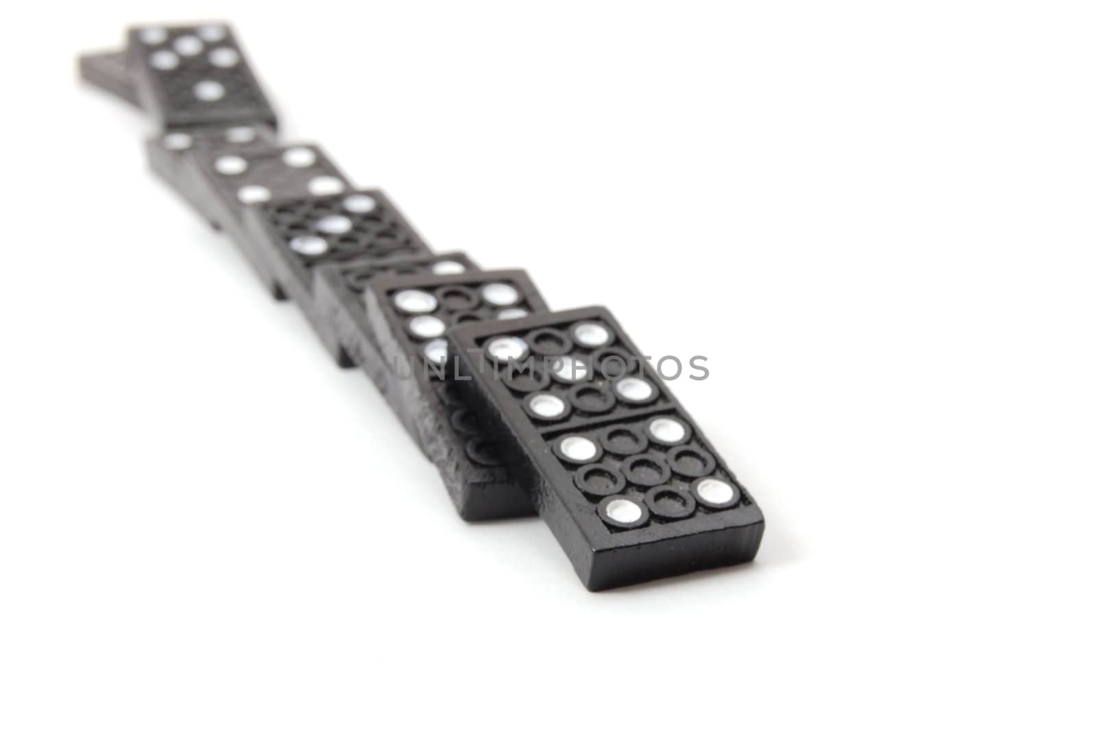 chain of dominoes isolated on a white background