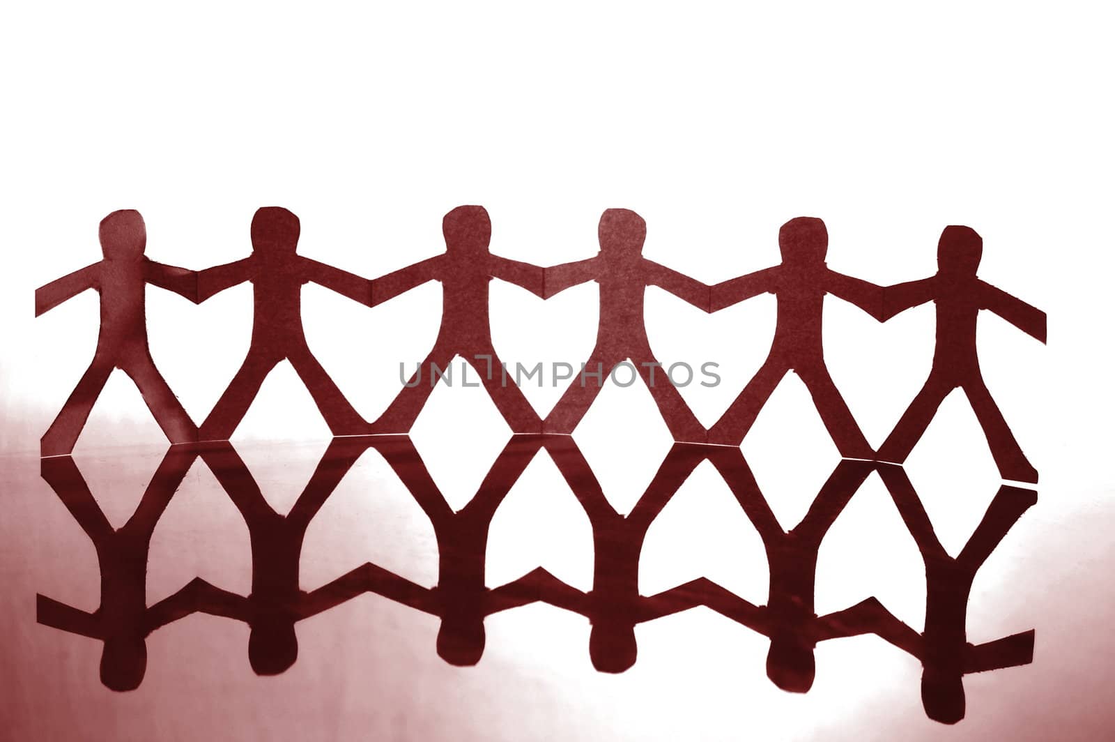 team of paper man showing concept of teamwork