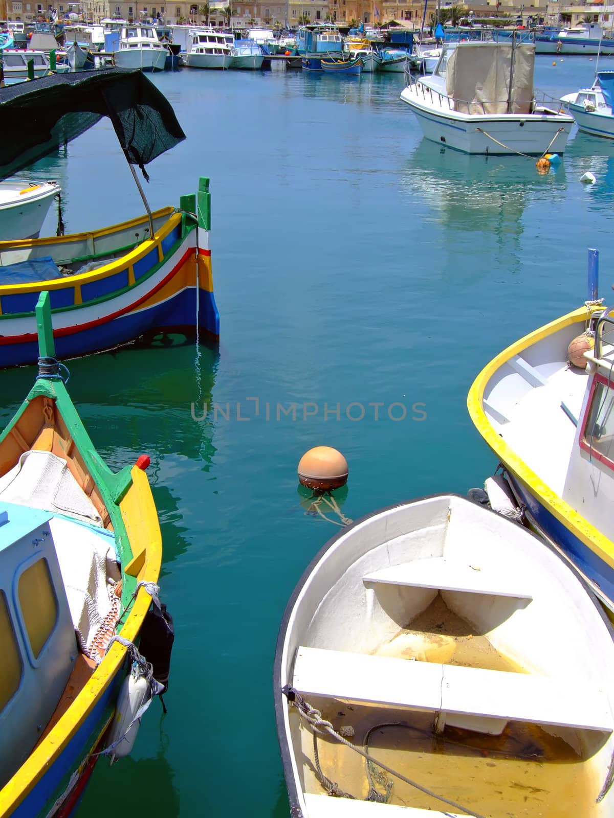 The old and tranquil fishing village of Marsaxlokk in Malta