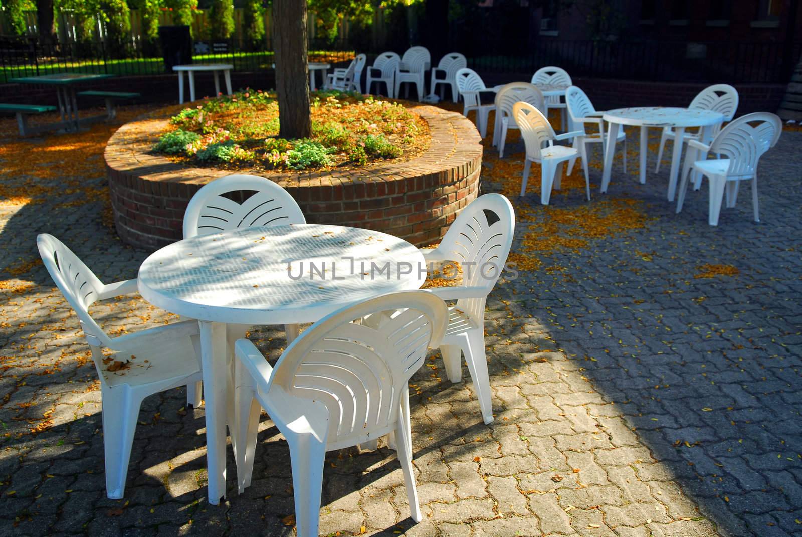 Empty tables of outdoor cafe in the fall