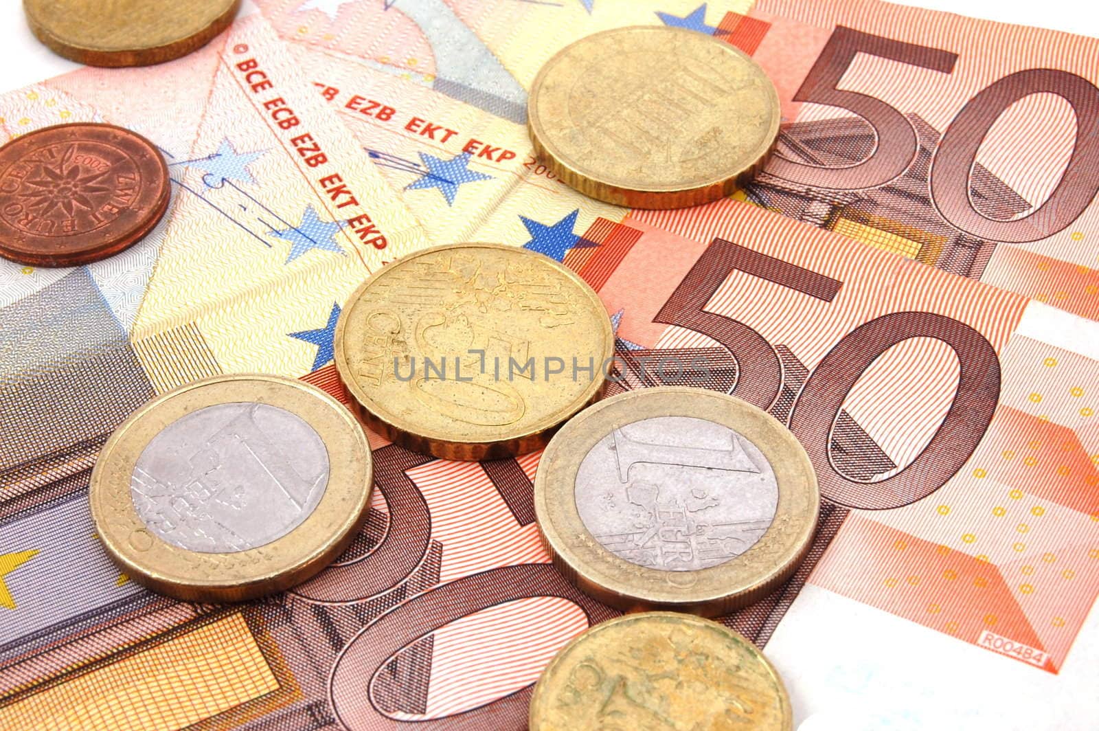 macro of euro bills and coins can be used as background