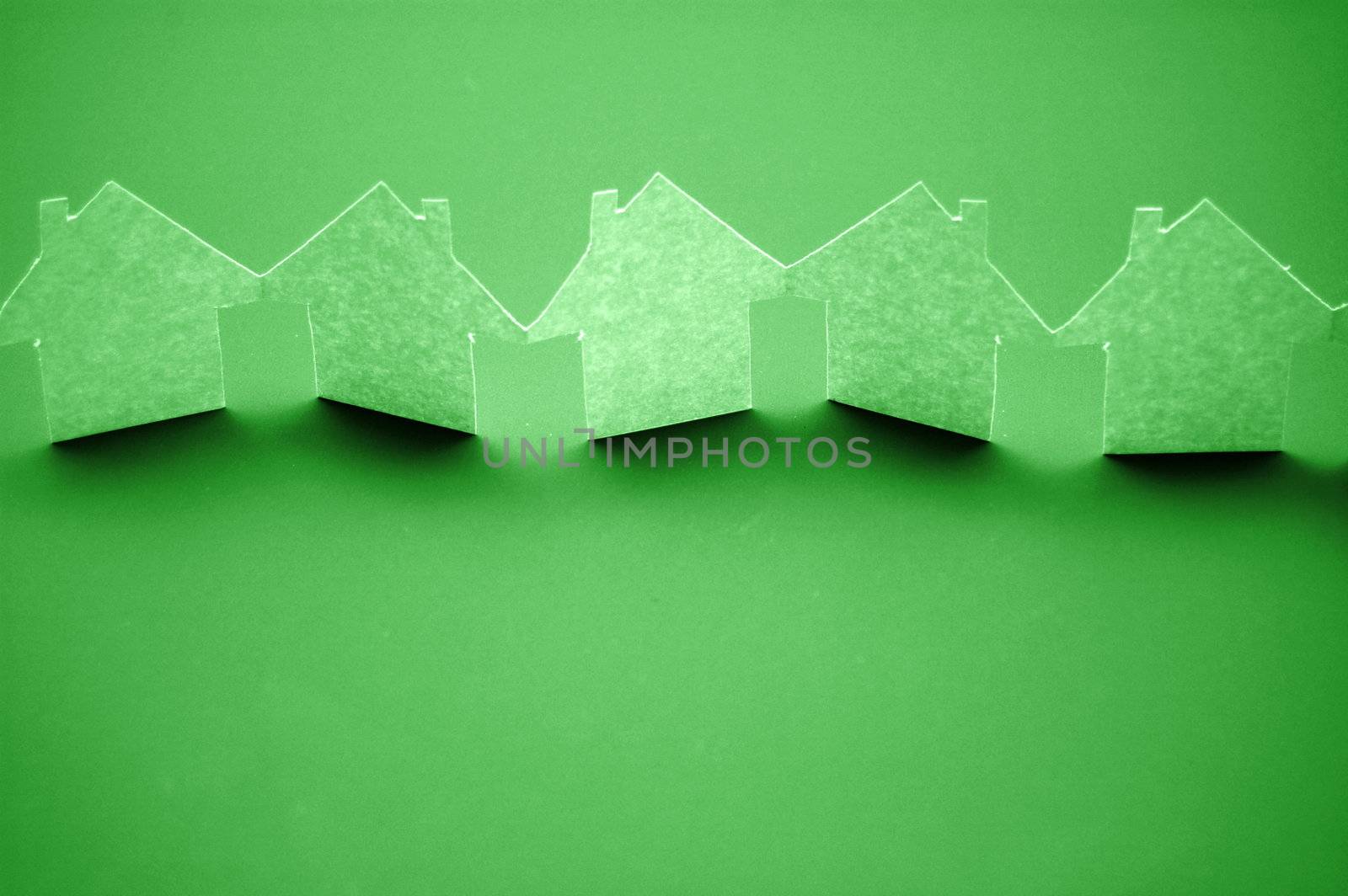 paper houses or homes showing a concept for real estate