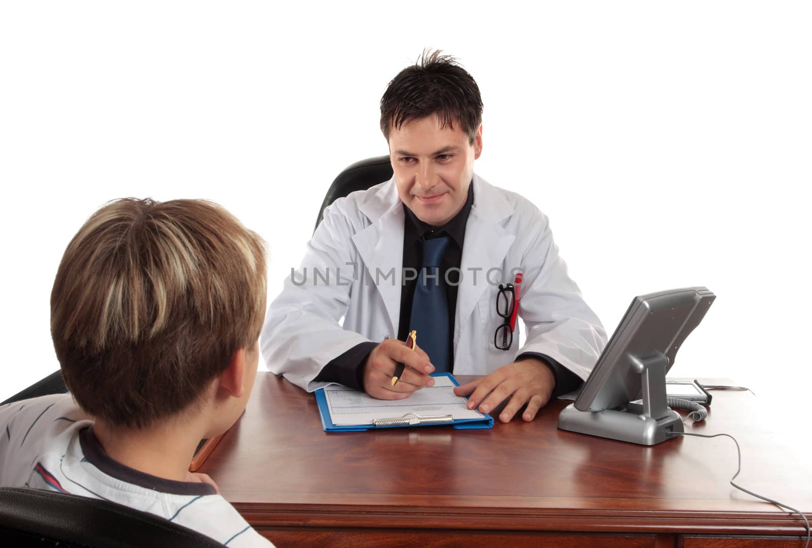 A caring paediatrician doctor in consultation with a child patient.