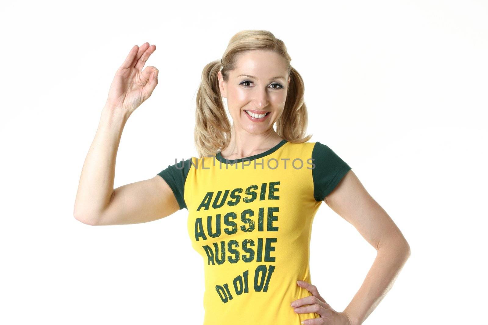 Female Aussie fan with a hand sign of approva, endorsement or recommendation.