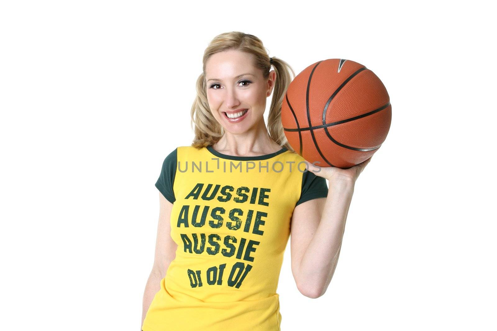 Adult sports fan holding a basketball