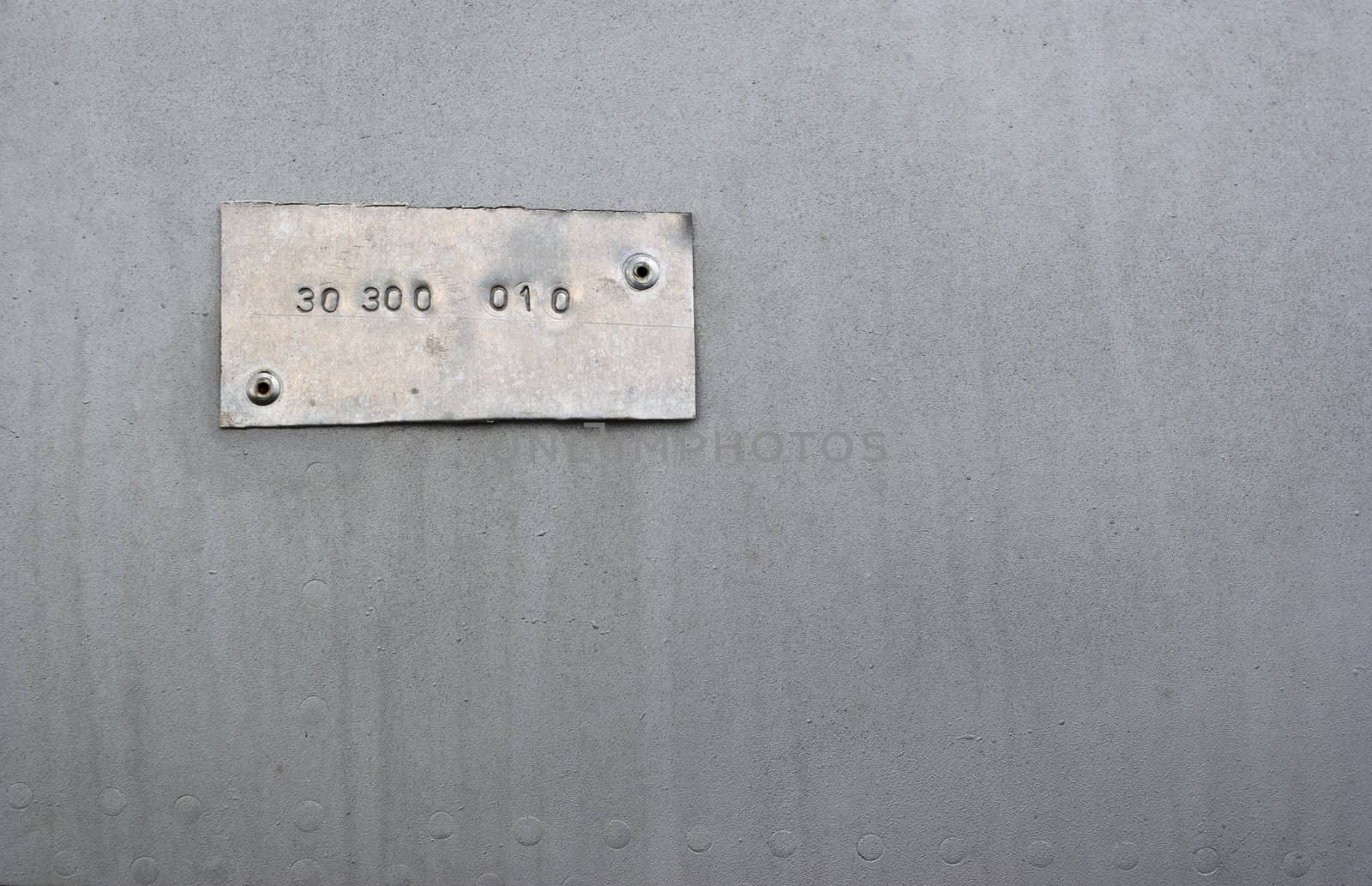 Brushed grunge metallic plate useful for backgrounds
