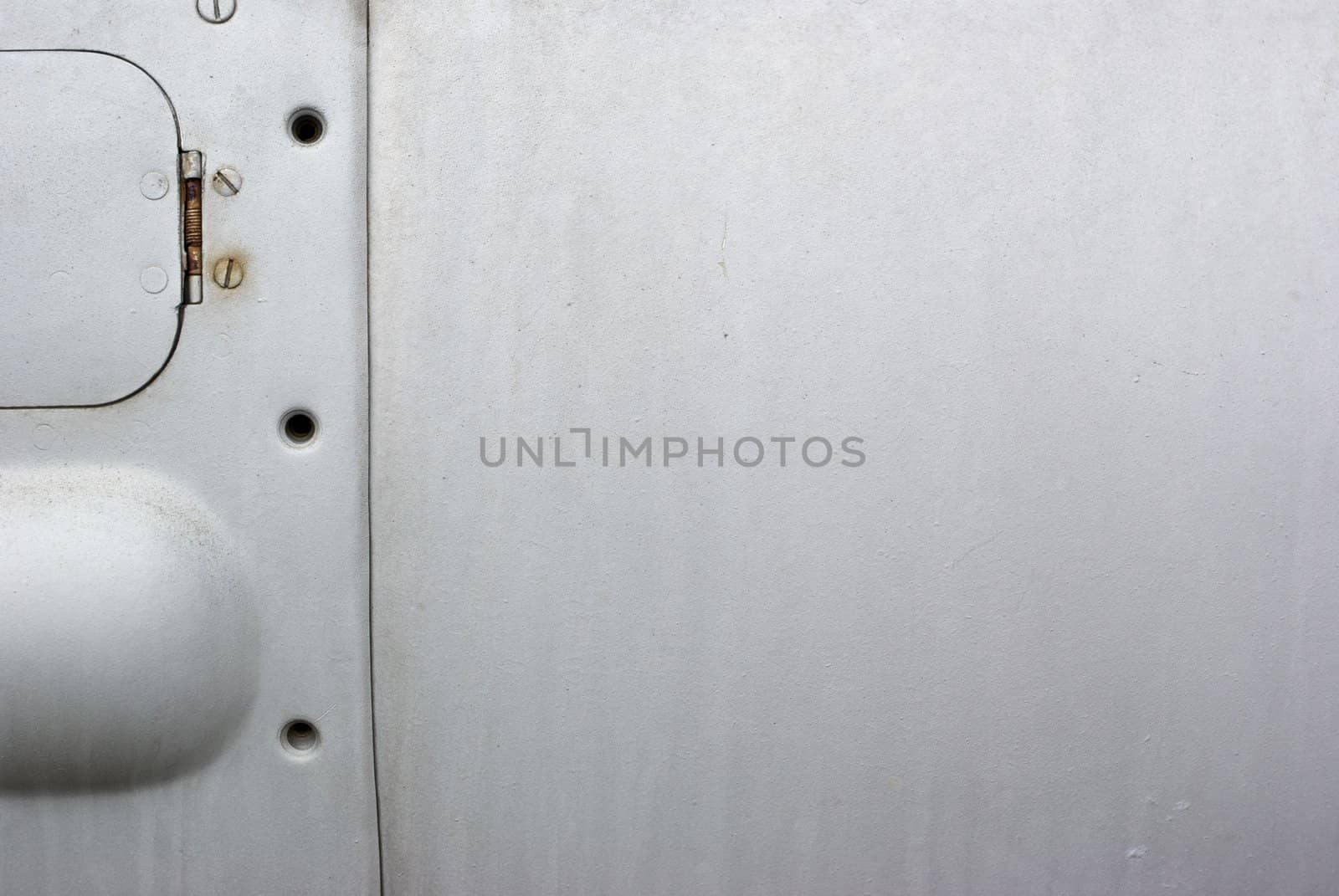 Brushed grunge metallic plate useful for backgrounds