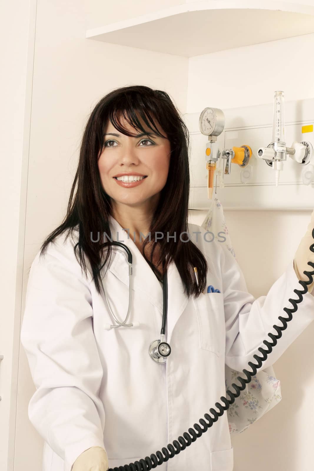Medical worker in ward with instruments

